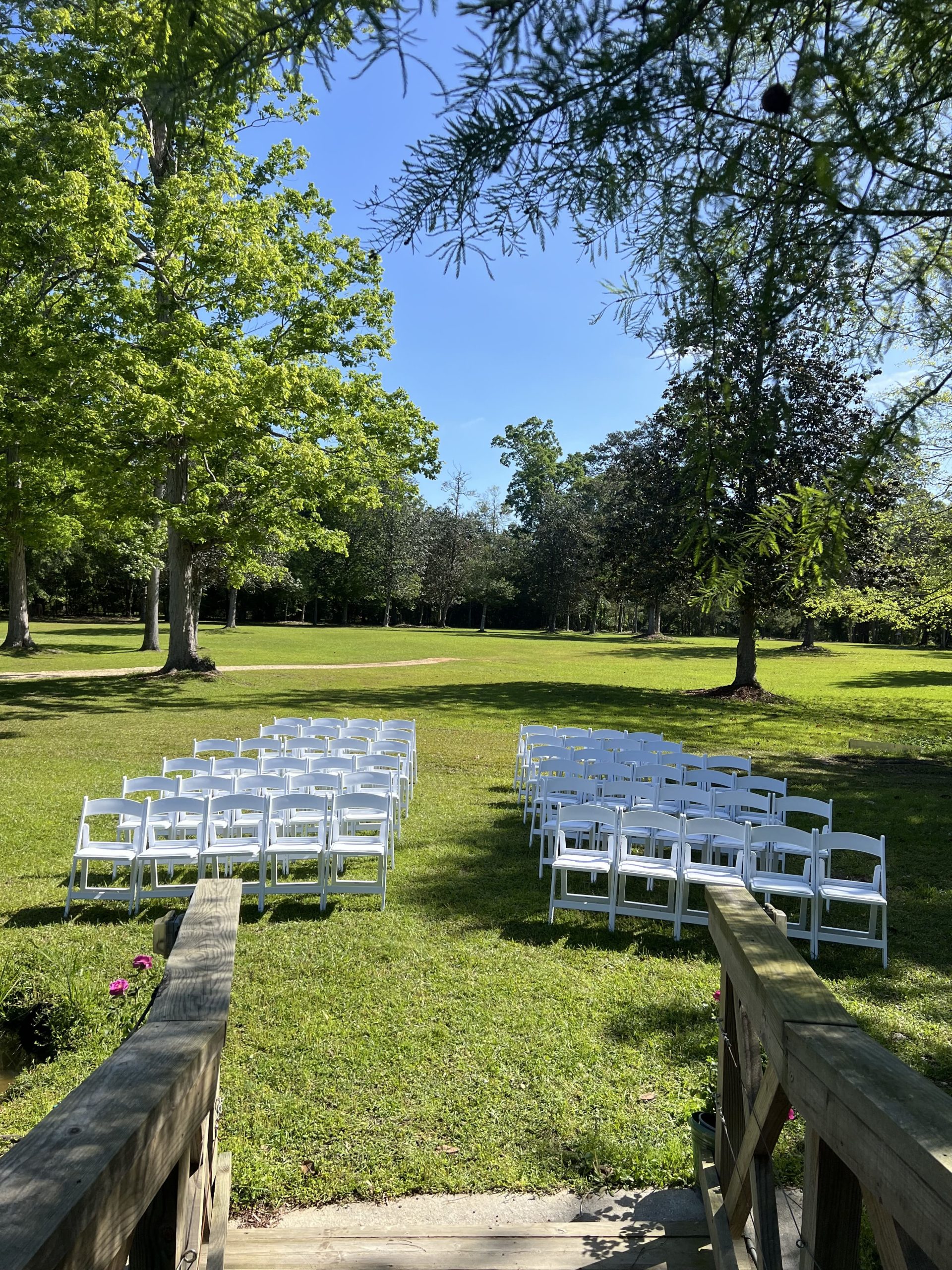 rented white chairs at outdoor event