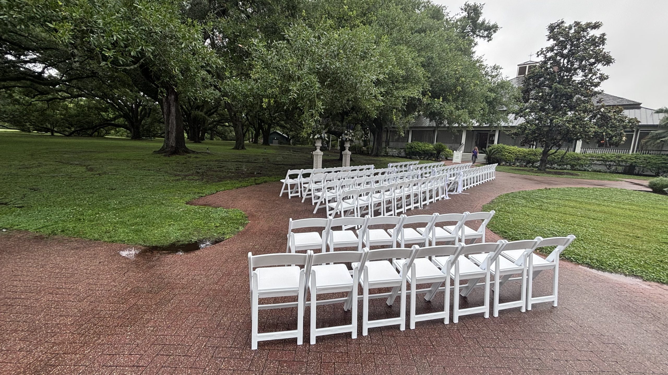Two sections of white chairs for event in new orleans, la.
